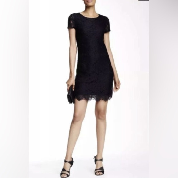 short sleeve midi dress made of medallion lace & outfitted with a scalloped hem. - Picture 1 of 5